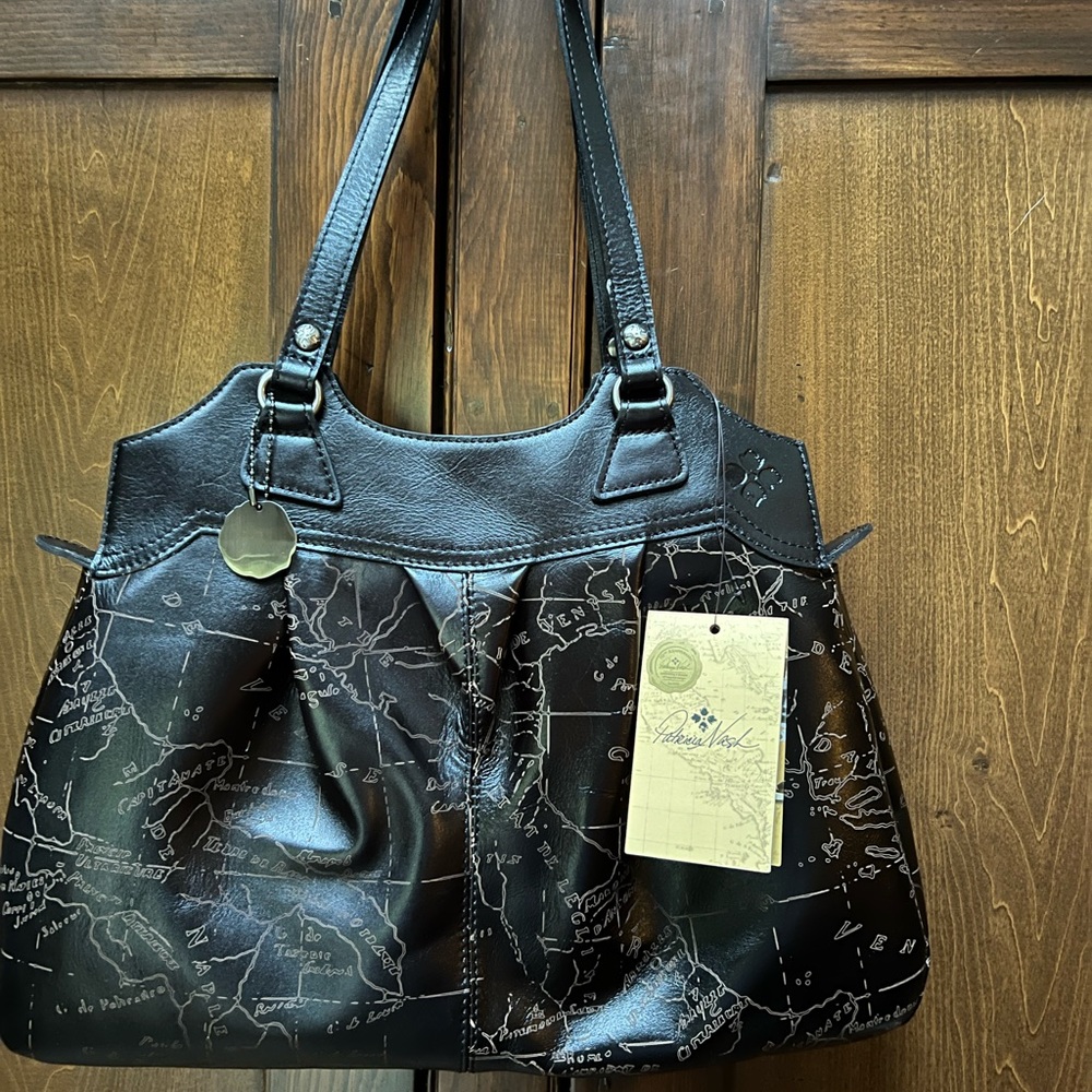 NWT Magnificant Patricia Nash NEW Black Bag. Laser Map Collection. Fabulous!!